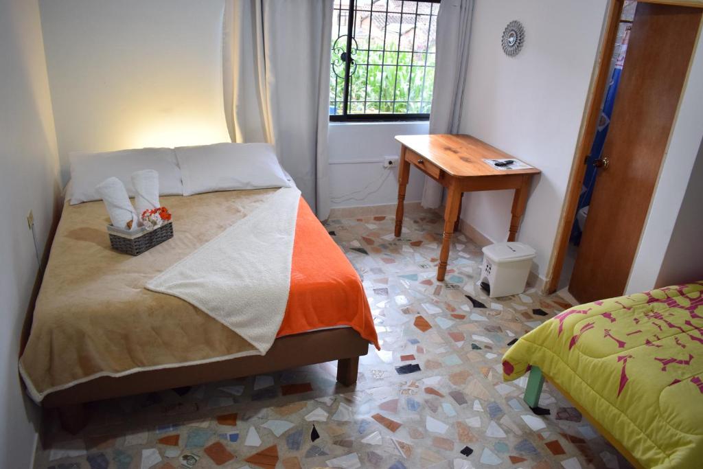 Postel nebo postele na pokoji v ubytování Hotel Casita de Belén