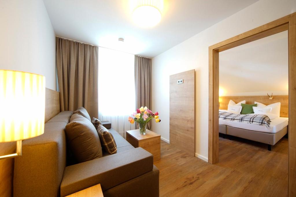 Postel nebo postele na pokoji v ubytování Gasthof-Hotel Dannerwirt