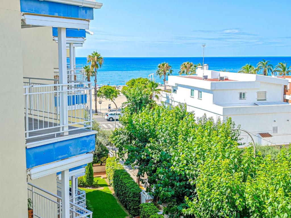 a view of the ocean from the balcony of a building at LITORAL COSTA DORADA - CORAL Only families in Cambrils