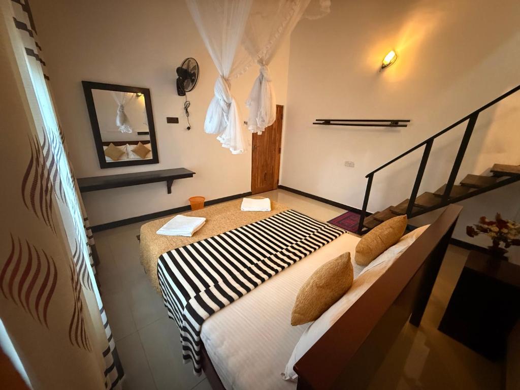Postel nebo postele na pokoji v ubytování Maya 44 Ella