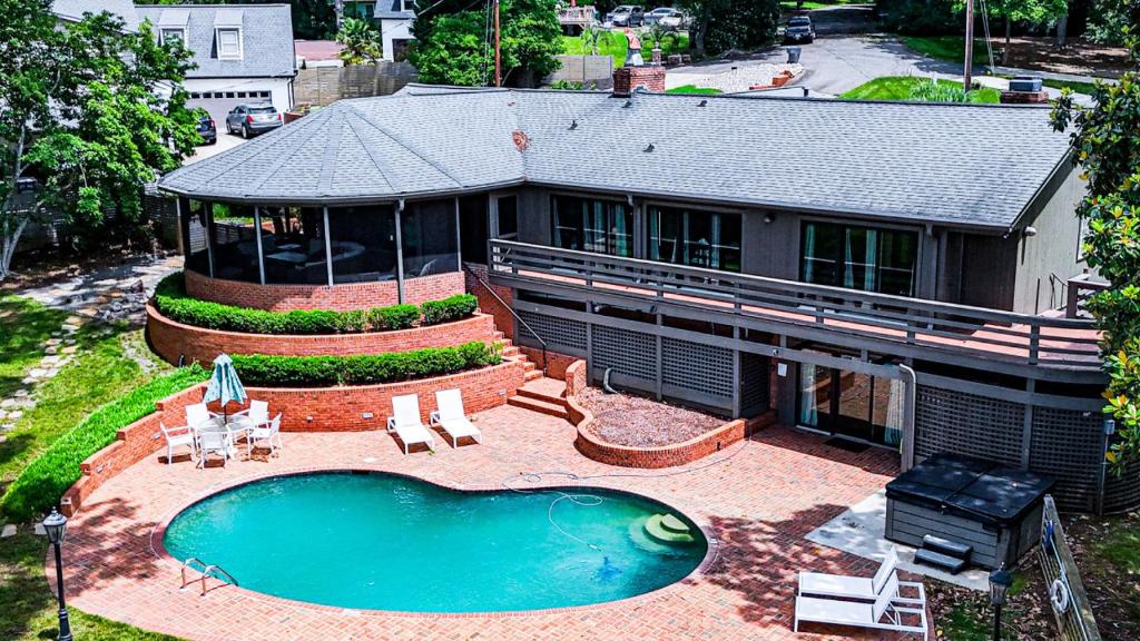 an overhead view of a house with a swimming pool at Paradise Point Lake Home in Charlotte