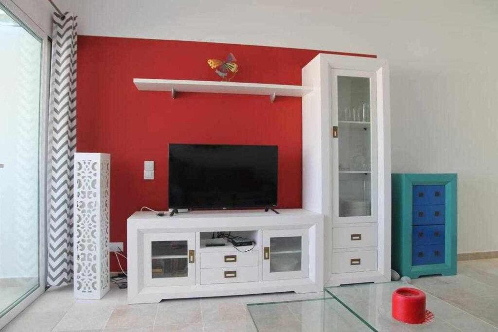 TV a/nebo společenská místnost v ubytování Bonito apartamento cerca la playa
