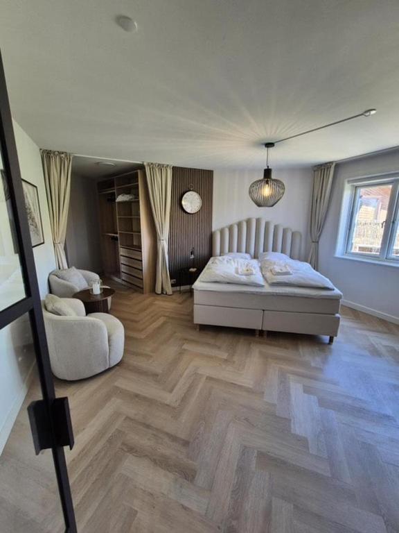 Postel nebo postele na pokoji v ubytování Stylish Studio in Copenhagen
