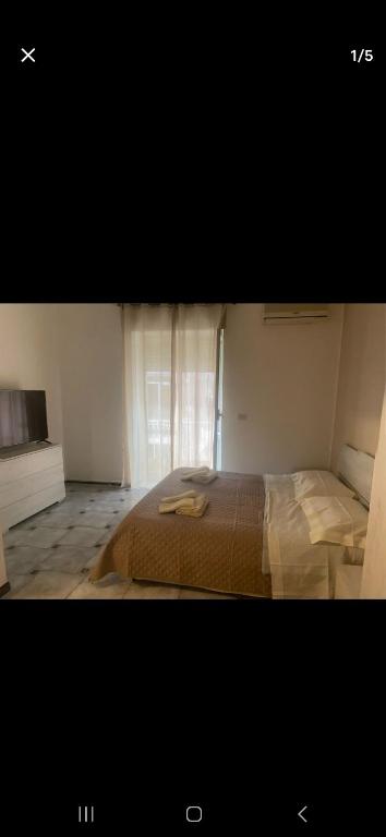 Ένα ή περισσότερα κρεβάτια σε δωμάτιο στο Galleria Colonna