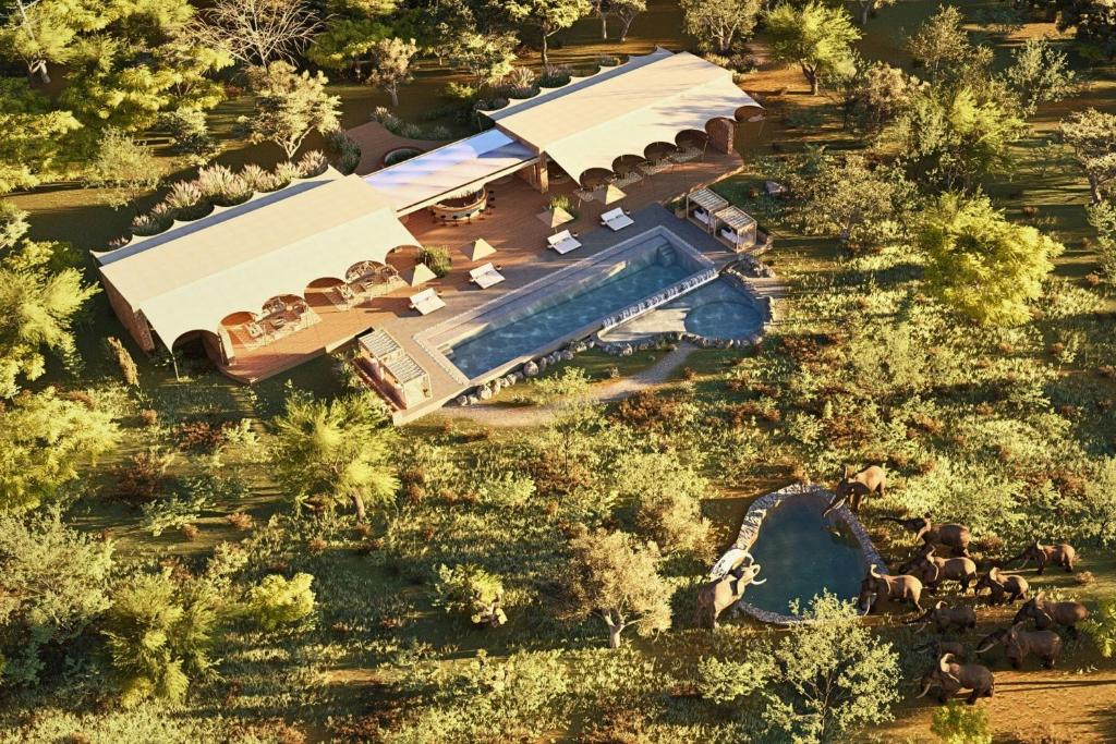 an overhead view of a resort with a swimming pool at Mapito Safari Camp, Serengeti, Autograph Collection in Serengeti