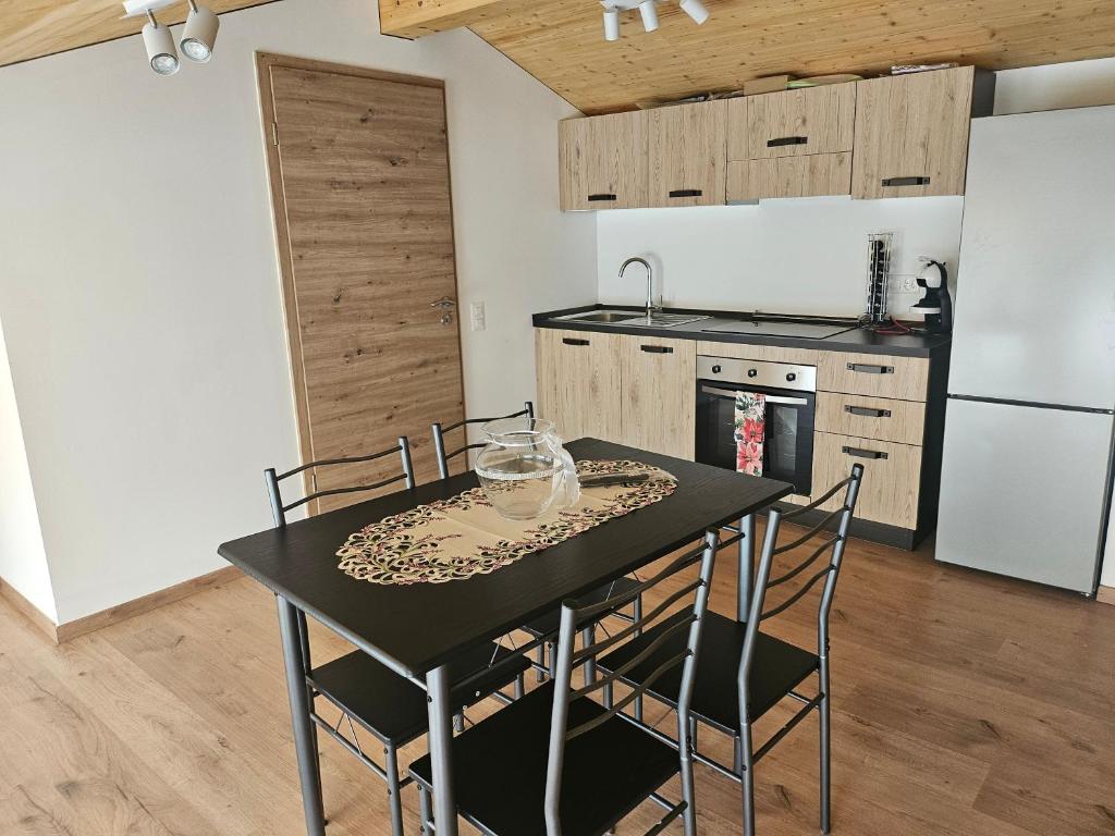 Kuchyň nebo kuchyňský kout v ubytování Attico Essebi