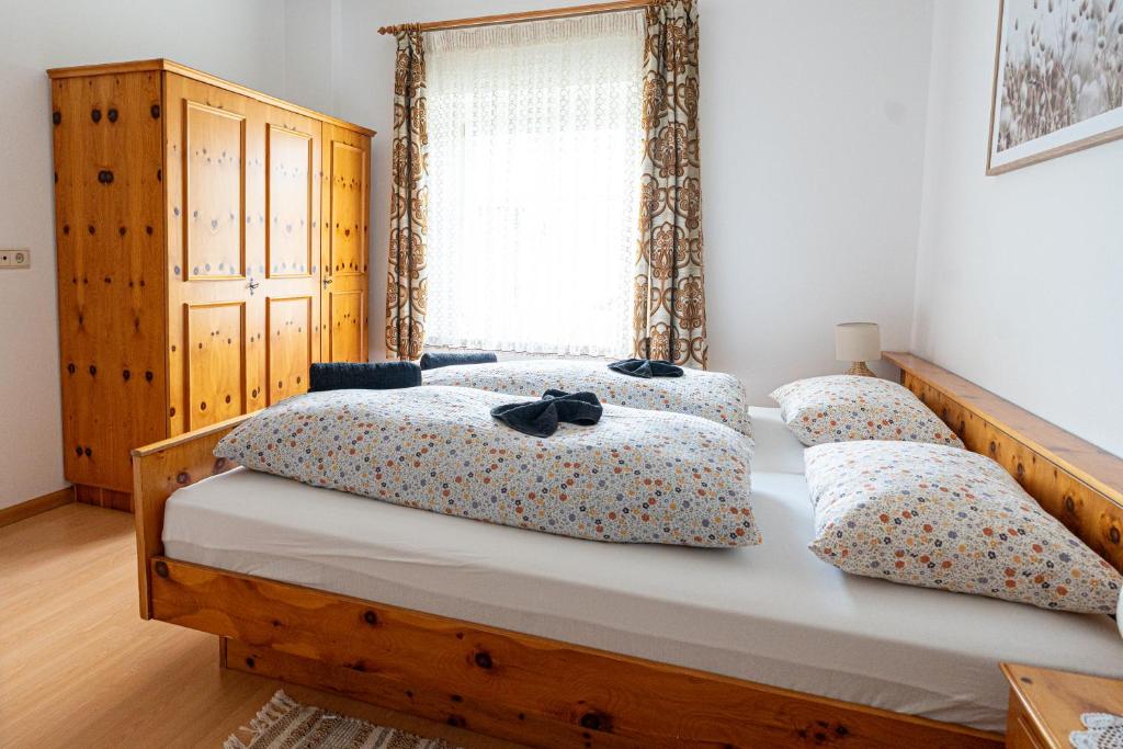 Postel nebo postele na pokoji v ubytování Stampferhof - Urlaub auf dem Bauernhof - Agriturismo