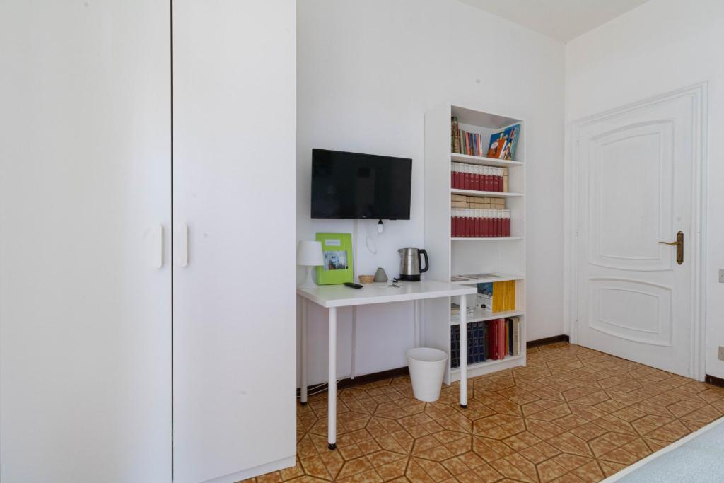 TV a/nebo společenská místnost v ubytování casa a colori