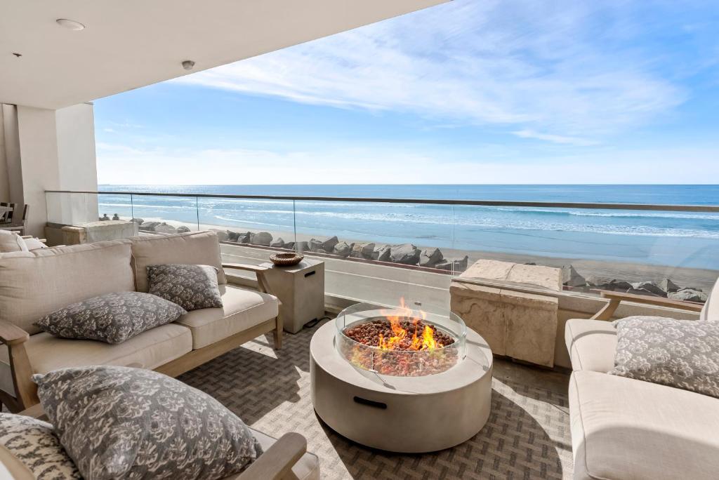 a living room with a view of the ocean at Oceanfront Penthouse Amazing Views in Oceanside