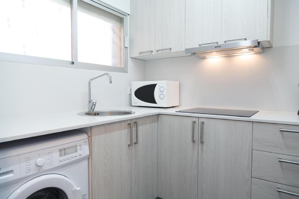 Kuchyňa alebo kuchynka v ubytovaní UHC Sorolla Apartments