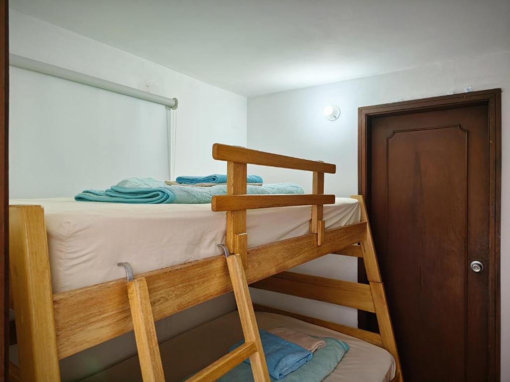 Postel nebo postele na pokoji v ubytování Kuyay Yachi Hostel