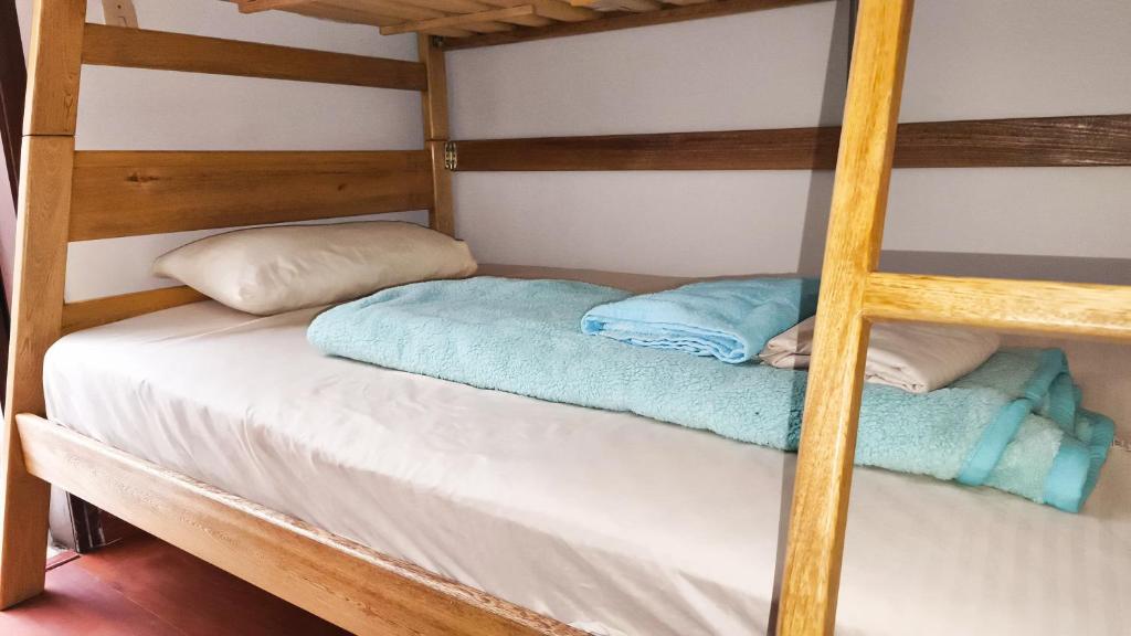 Postel nebo postele na pokoji v ubytování Kuyay Yachi Hostel