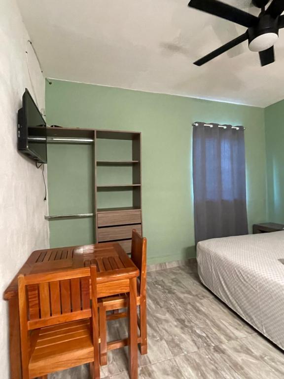Postel nebo postele na pokoji v ubytování Playa Arena