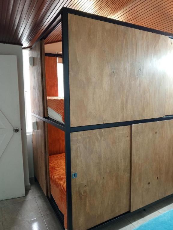 Postel nebo postele na pokoji v ubytování Kuyay Yachi Hostel