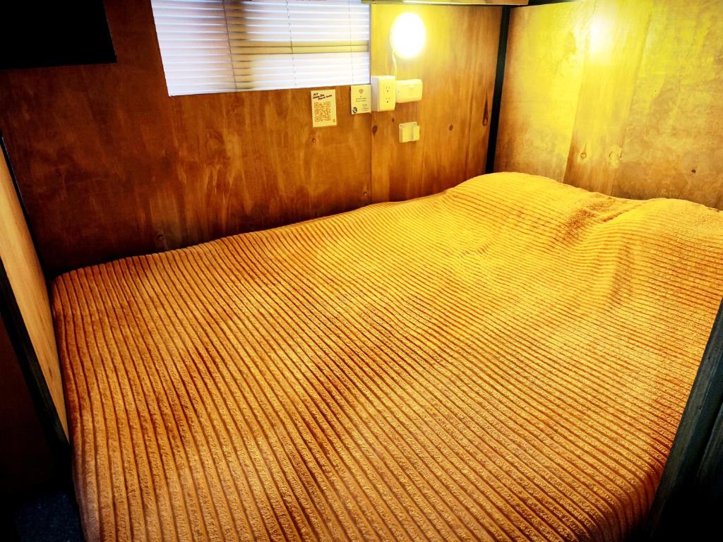 Postel nebo postele na pokoji v ubytování Kuyay Yachi Hostel