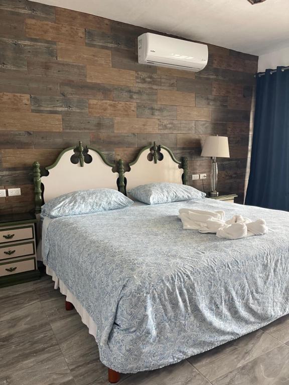Postel nebo postele na pokoji v ubytování Playa Arena