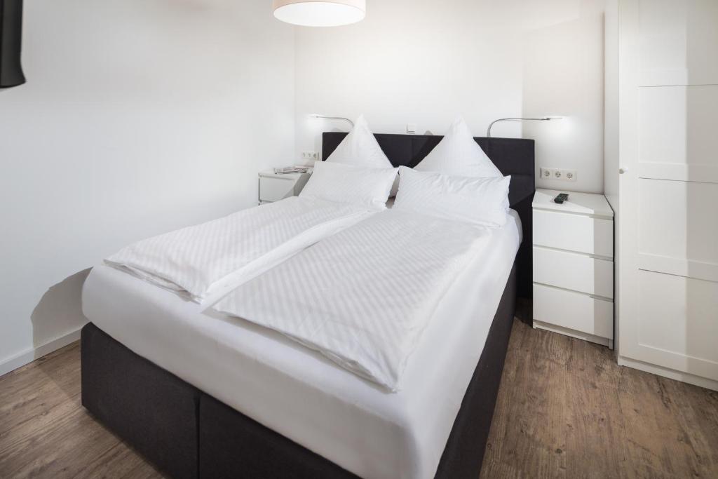 Postel nebo postele na pokoji v ubytování Ferienhaus Papenfuß