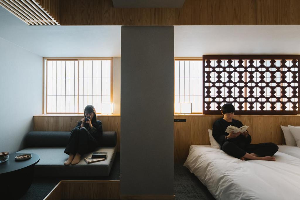 Voodi või voodid majutusasutuse hotel nansui toas