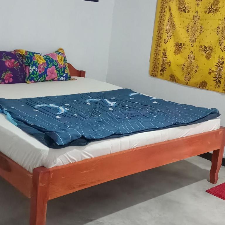 Postel nebo postele na pokoji v ubytování Phonluer Angkor Homestay,