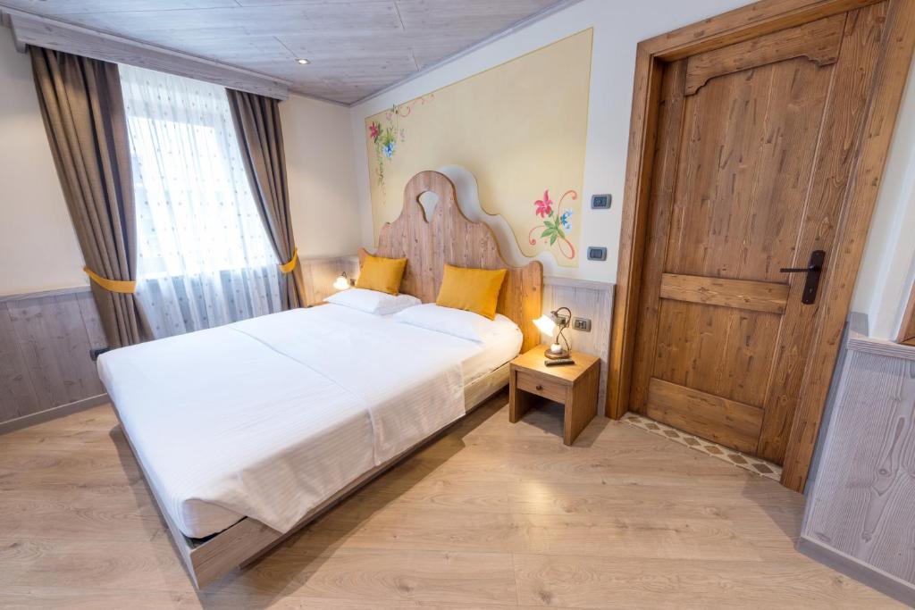 Posteľ alebo postele v izbe v ubytovaní Agritur Casa Fabri