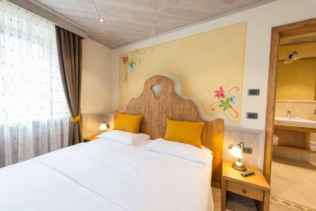 Posteľ alebo postele v izbe v ubytovaní Agritur Casa Fabri