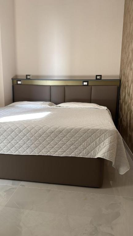 Postel nebo postele na pokoji v ubytování Hotel Kursaal