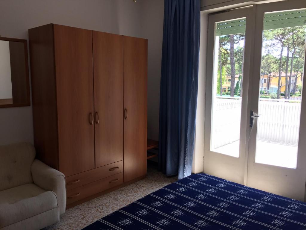 Postel nebo postele na pokoji v ubytování Pensione Giardino