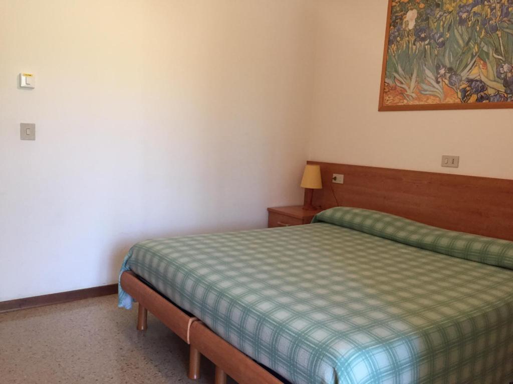 Postel nebo postele na pokoji v ubytování Pensione Giardino