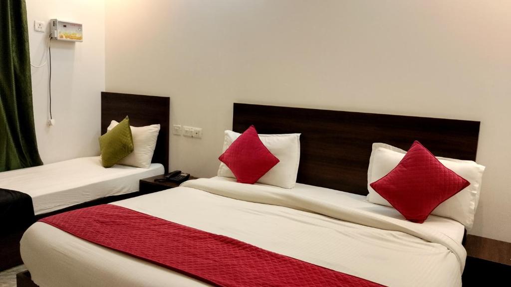 Postel nebo postele na pokoji v ubytování hotel julee