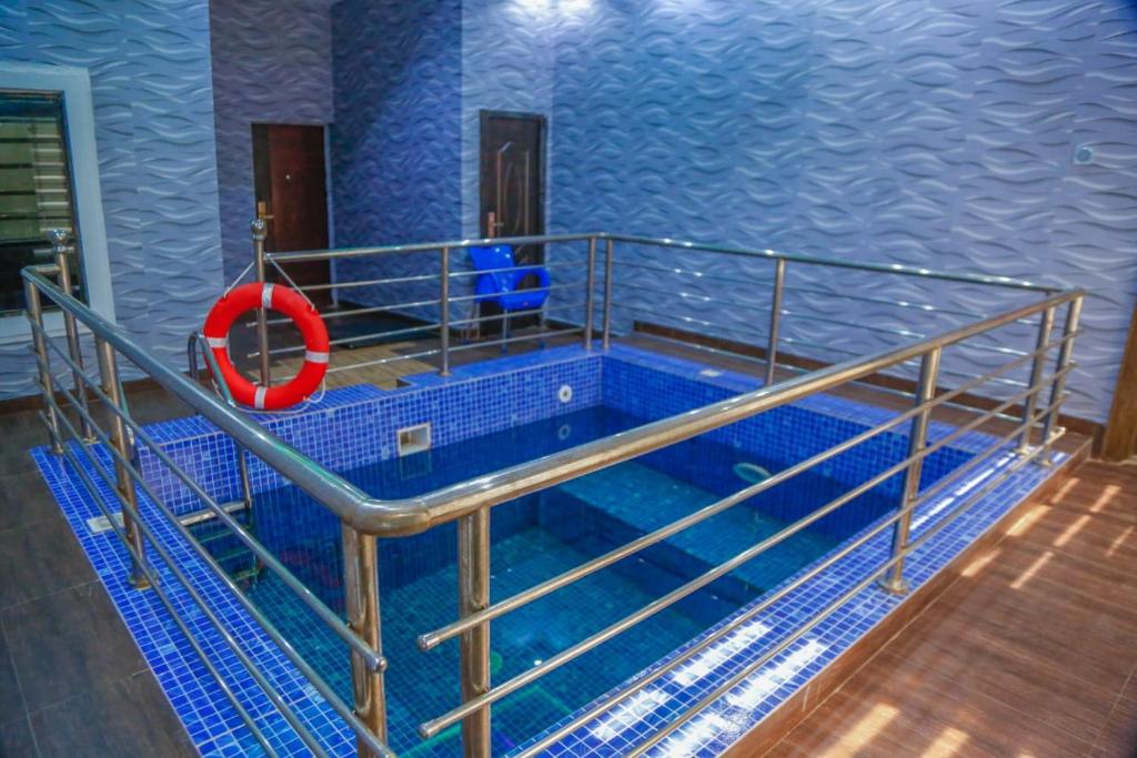 Bazén v ubytování The Clifford Apartment Owerri nebo v jeho okolí