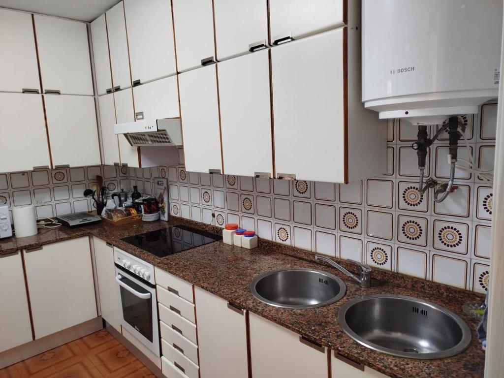 Køkken eller tekøkken på Piso vacacional Coruña