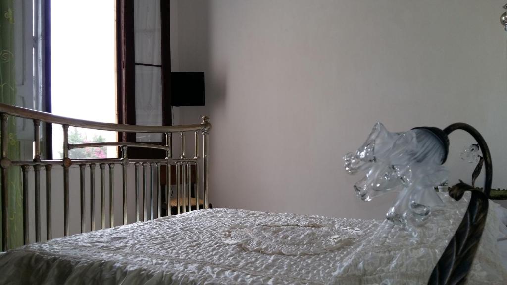 Postel nebo postele na pokoji v ubytování B&B Le Macine 1868