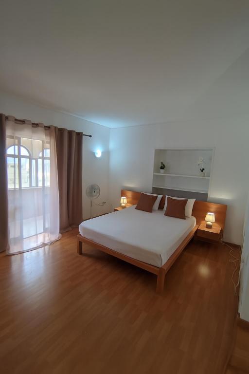 Postel nebo postele na pokoji v ubytování Casa TIANA