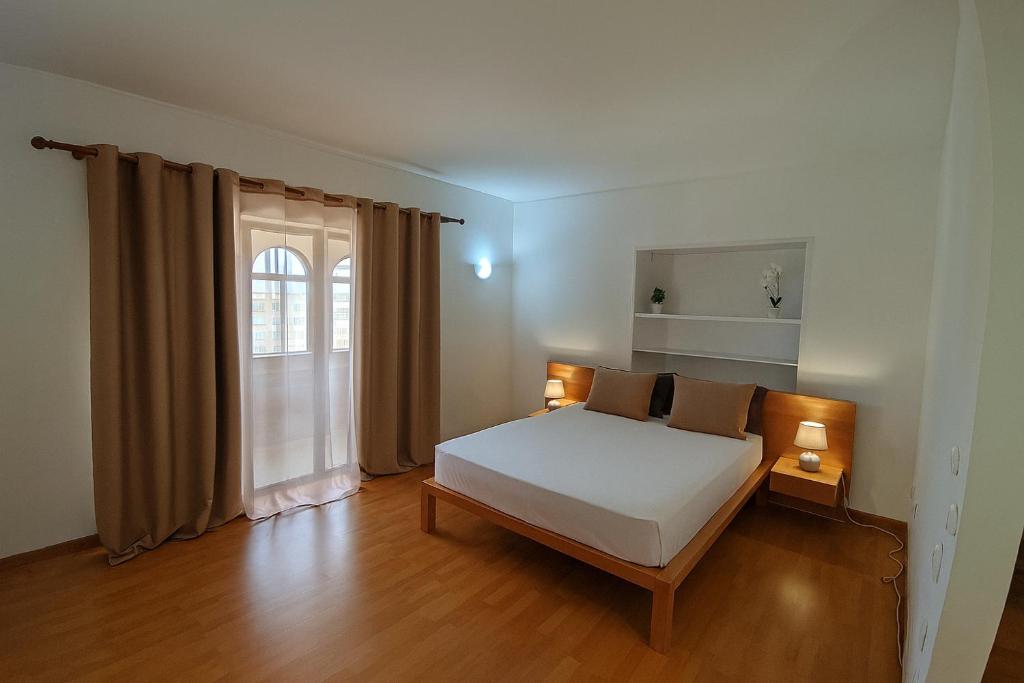 Postel nebo postele na pokoji v ubytování Casa TIANA