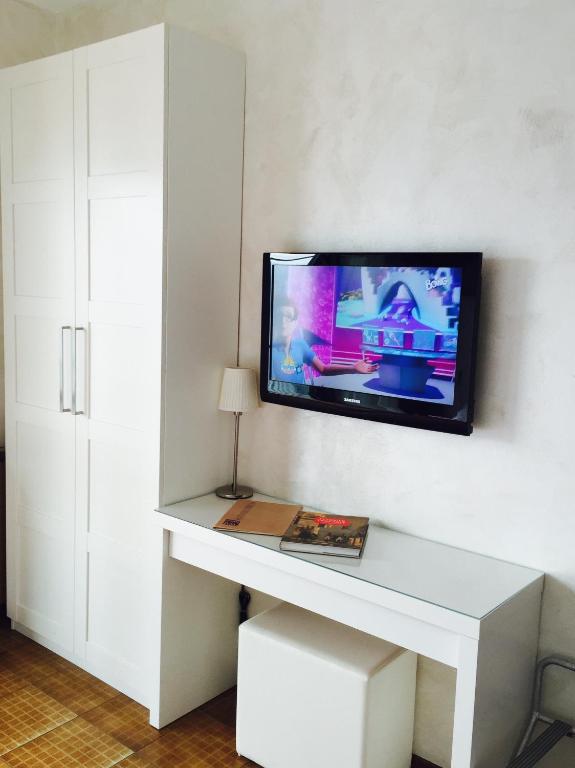 TV a/nebo společenská místnost v ubytování Esprit D'Hotel Panoramico