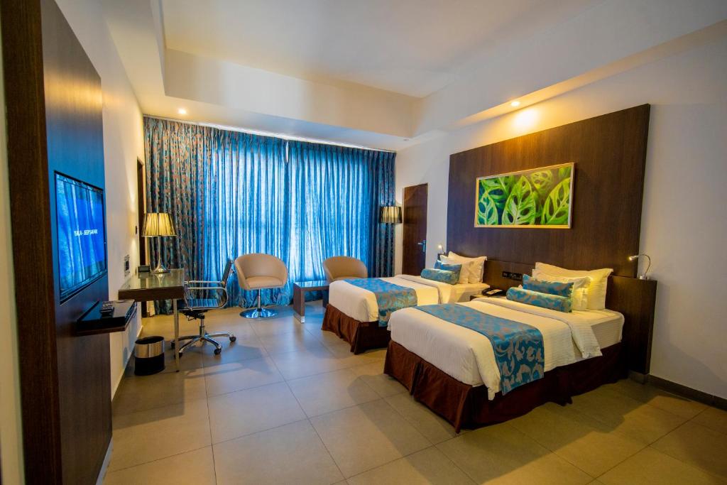 Postel nebo postele na pokoji v ubytování Best Western Elyon Colombo