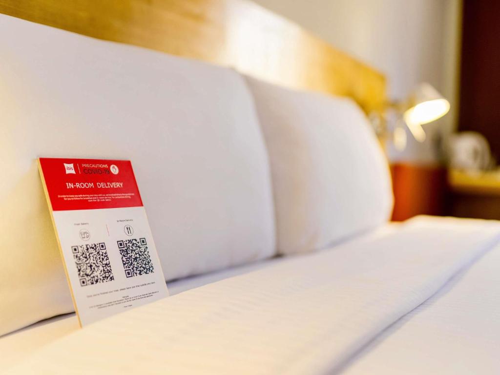 Postel nebo postele na pokoji v ubytování Ibis Guadalajara Expo