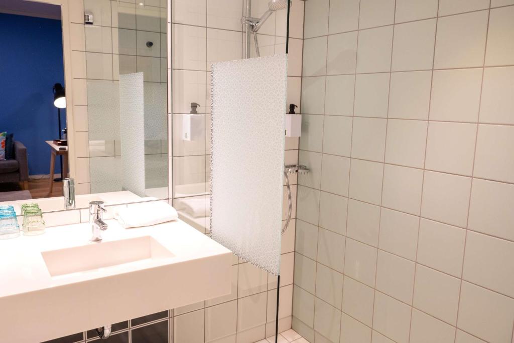 Koupelna v ubytování Scandic Vulkan