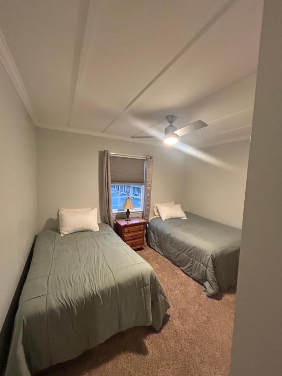 Postel nebo postele na pokoji v ubytování Boulevard Motel
