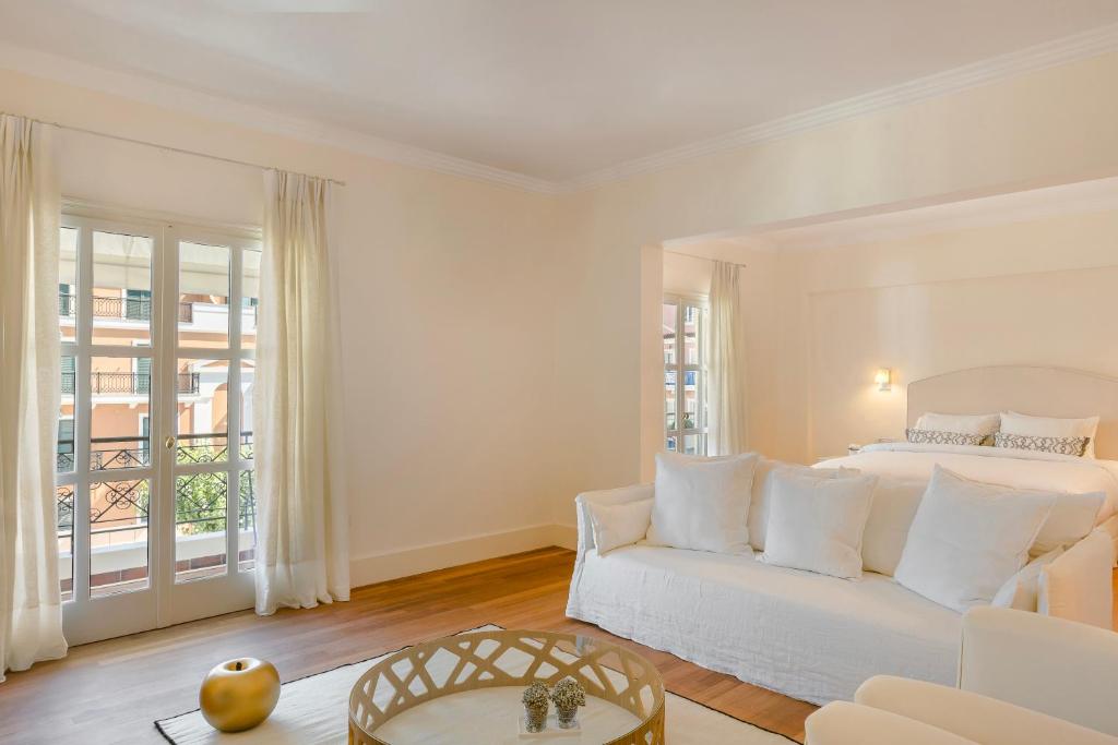 Posteľ alebo postele v izbe v ubytovaní Etoile Luxury Suites