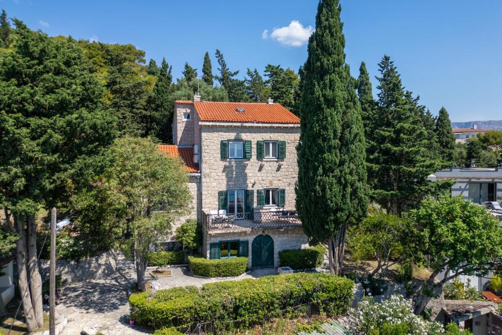 an aerial view of a house with trees at Villa Mediteran in Split