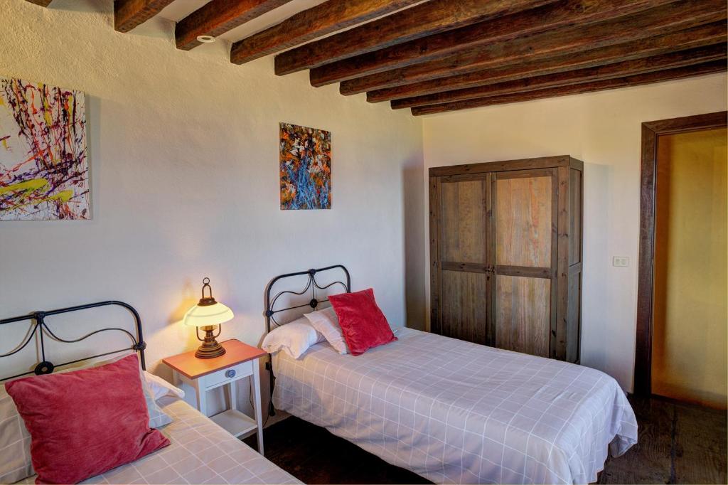 A bed or beds in a room at Celeste
