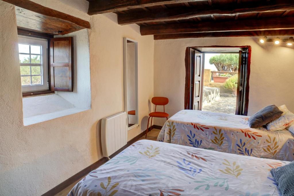 A bed or beds in a room at Celeste
