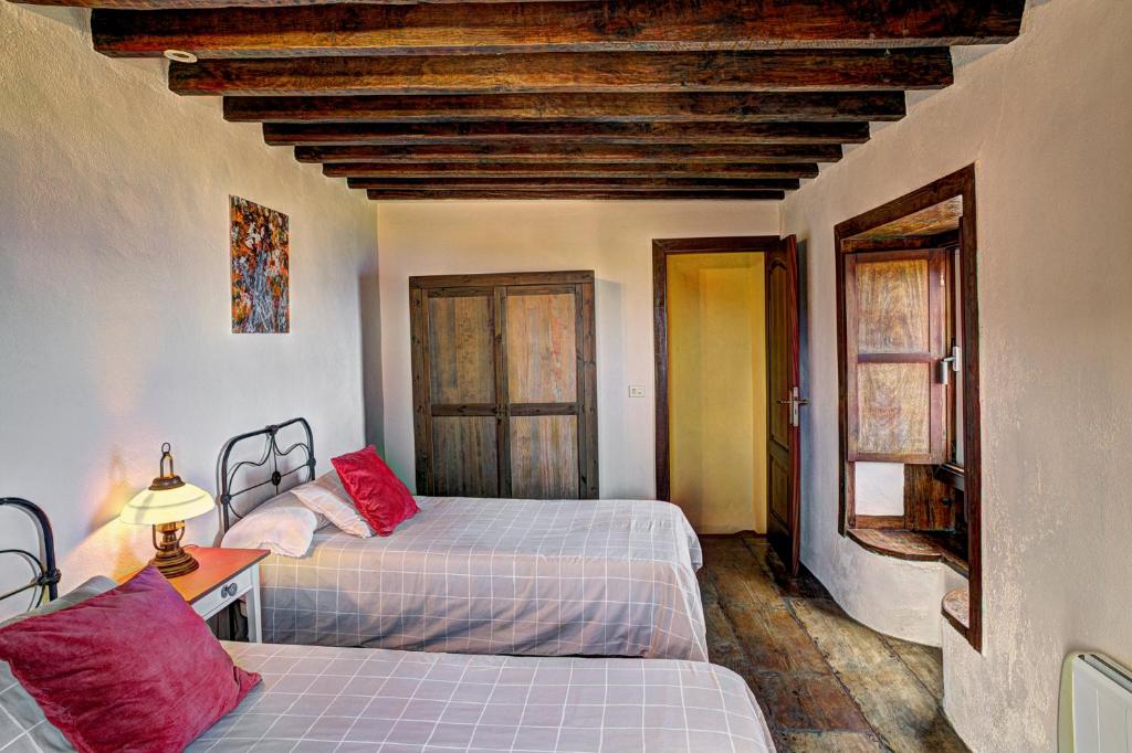 A bed or beds in a room at Celeste