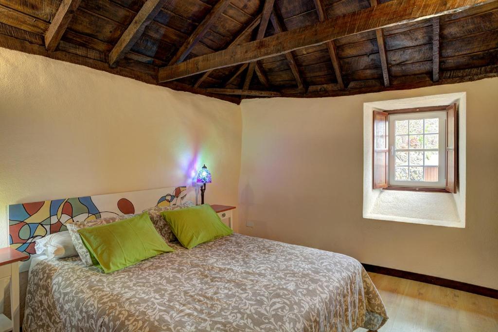 A bed or beds in a room at Celeste