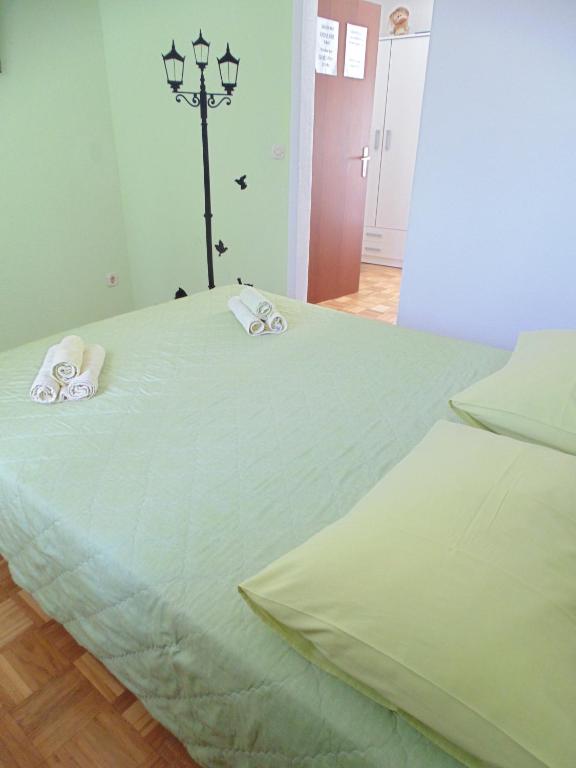 Postel nebo postele na pokoji v ubytování Guest House Petricevic