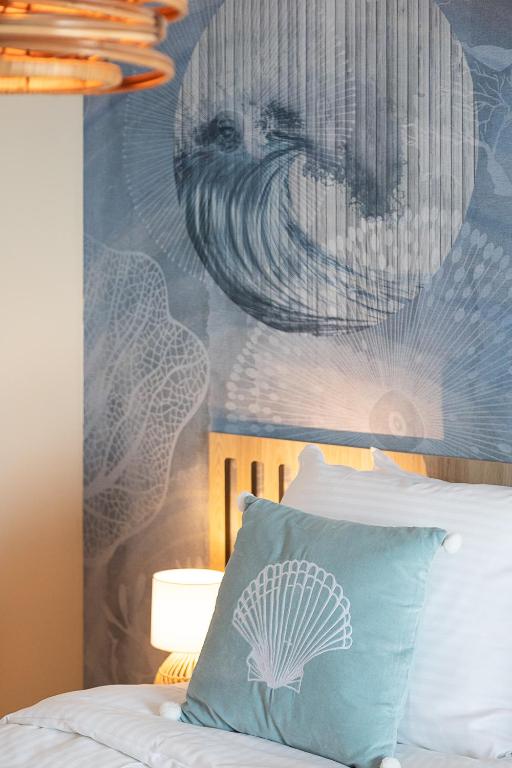Postel nebo postele na pokoji v ubytování Beachfront Boutiquehotel