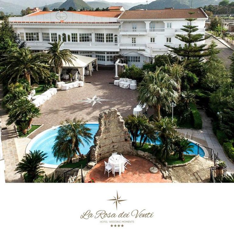 an aerial view of a hotel with a pool and a building at Hotel La Rosa Dei Venti in Campogrande