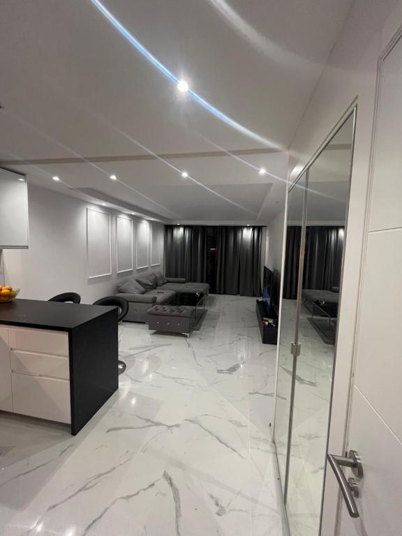 Χώρος καθιστικού στο Parque Santiago 1 luxury apartament 229 pool view