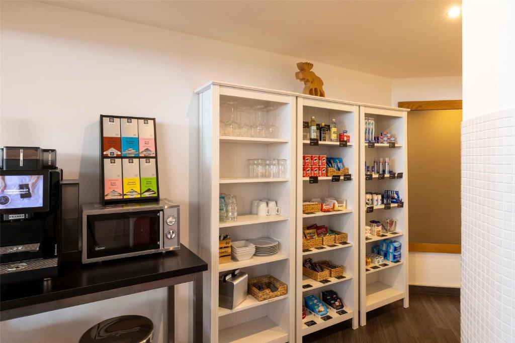 Kuchyň nebo kuchyňský kout v ubytování Scandic Berlin Kurfürstendamm